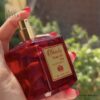 ادو تویلت زنانه و مردانه TRI مدل Rouge 500 Red حجم 100 میلی‌لیتر – رایحه‌ای گرم، شیرین و چوبی.۱
